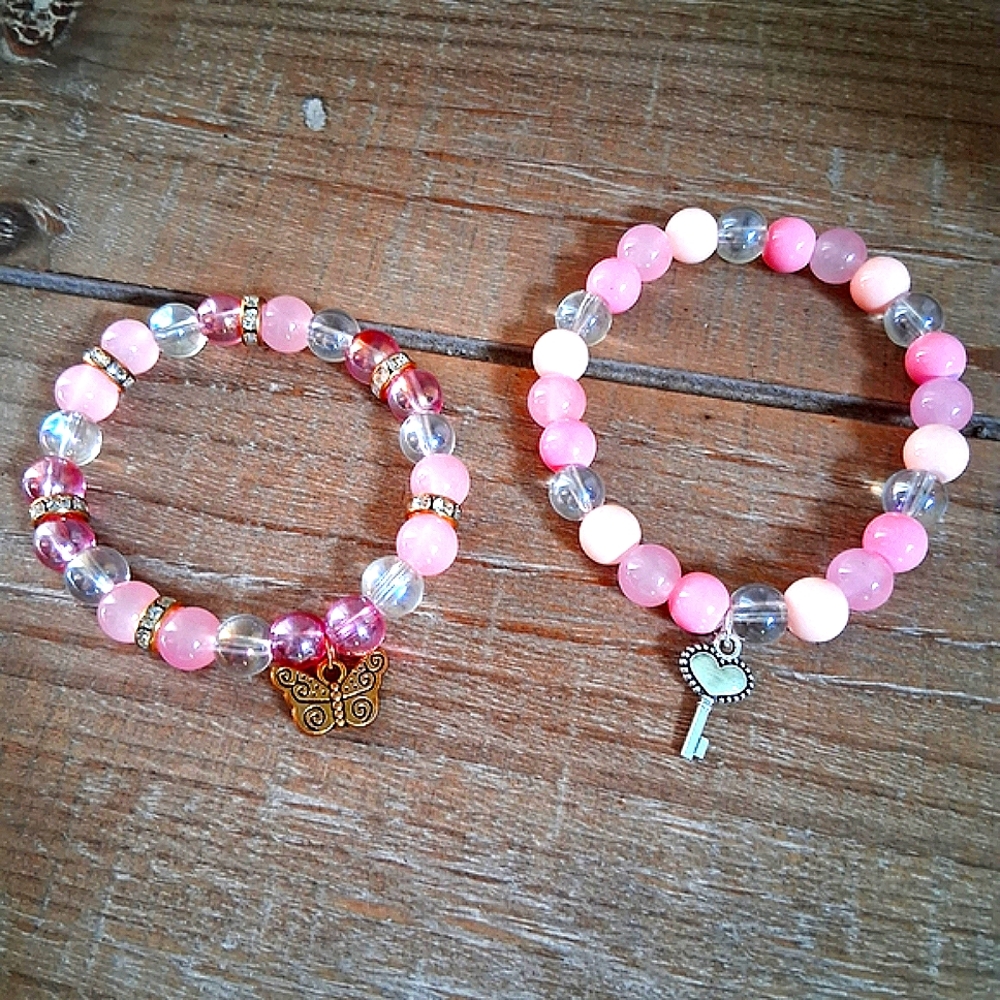 Pink and Clear Beaded Bracelets with Charms